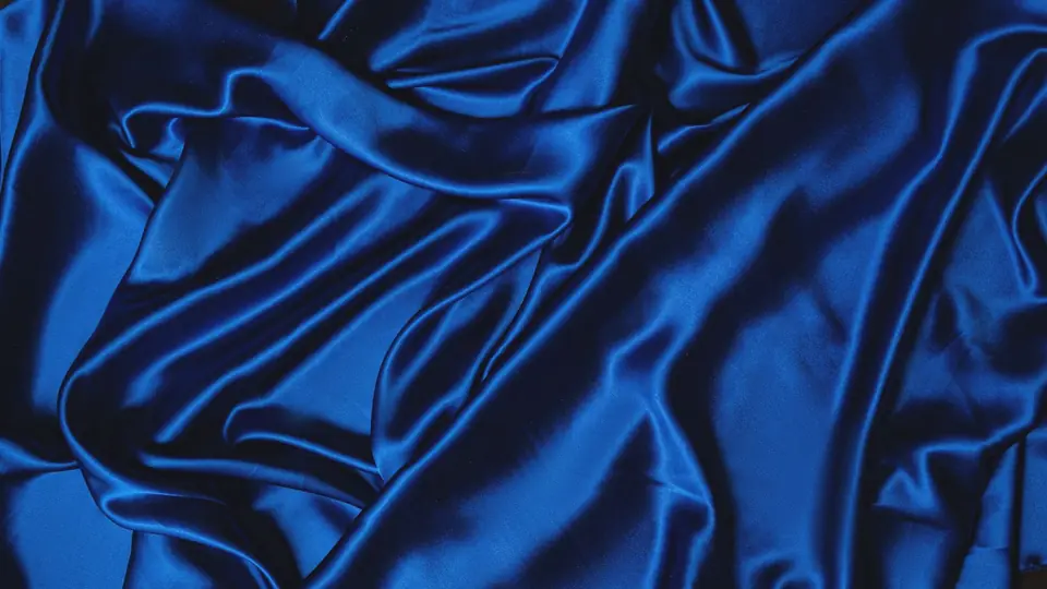 Deep blue satin in loose folds